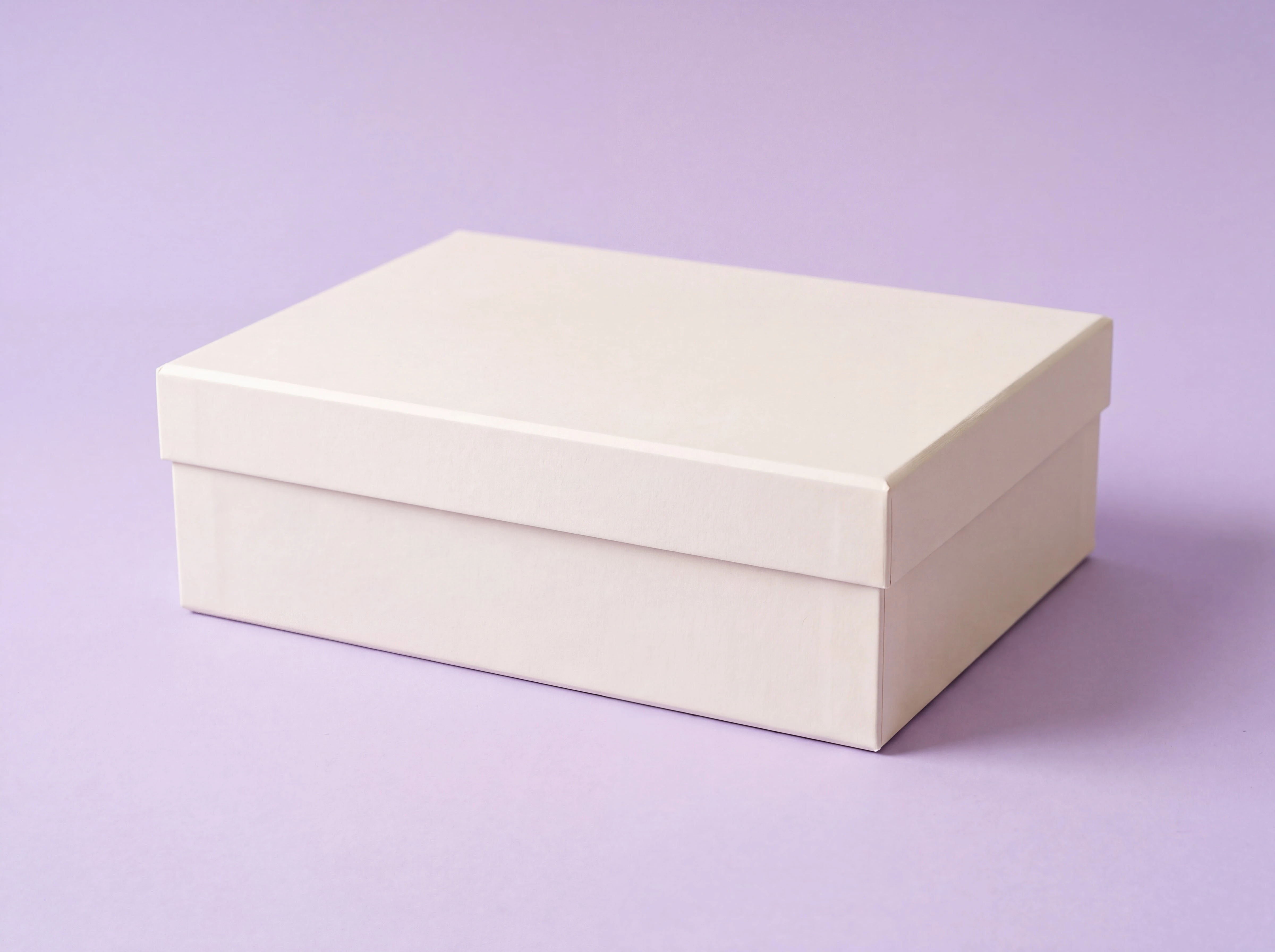 Reference-driven plain ivory presentation box before artwork application
