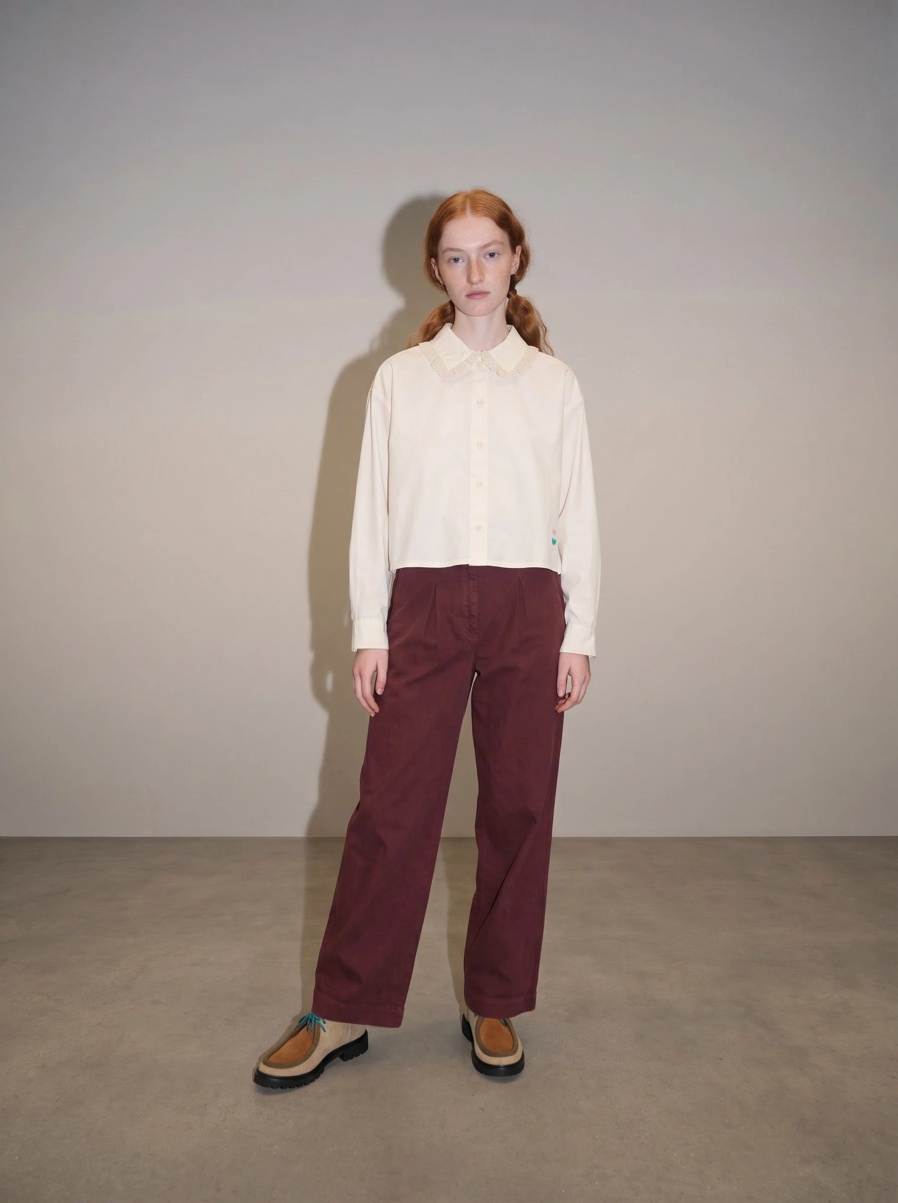 The same referenced outfit with on-camera flash and a harder shadow behind the model