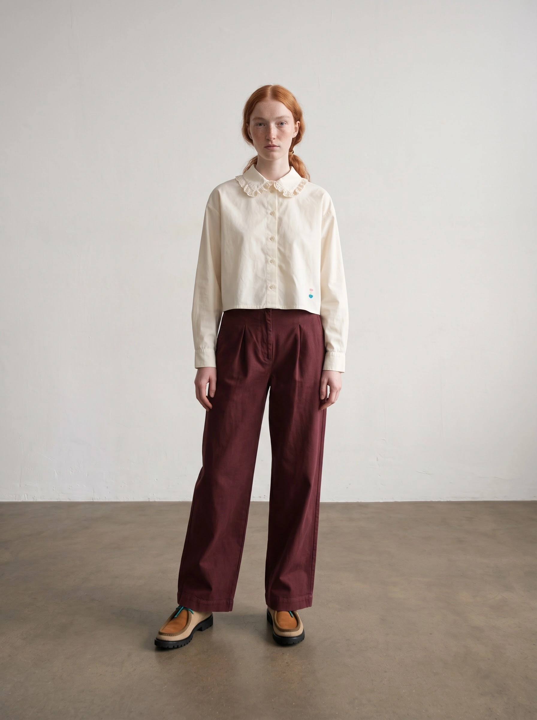 Second workshop result showing the same cream shirt, burgundy trousers and suede shoes in another front-facing full-length image