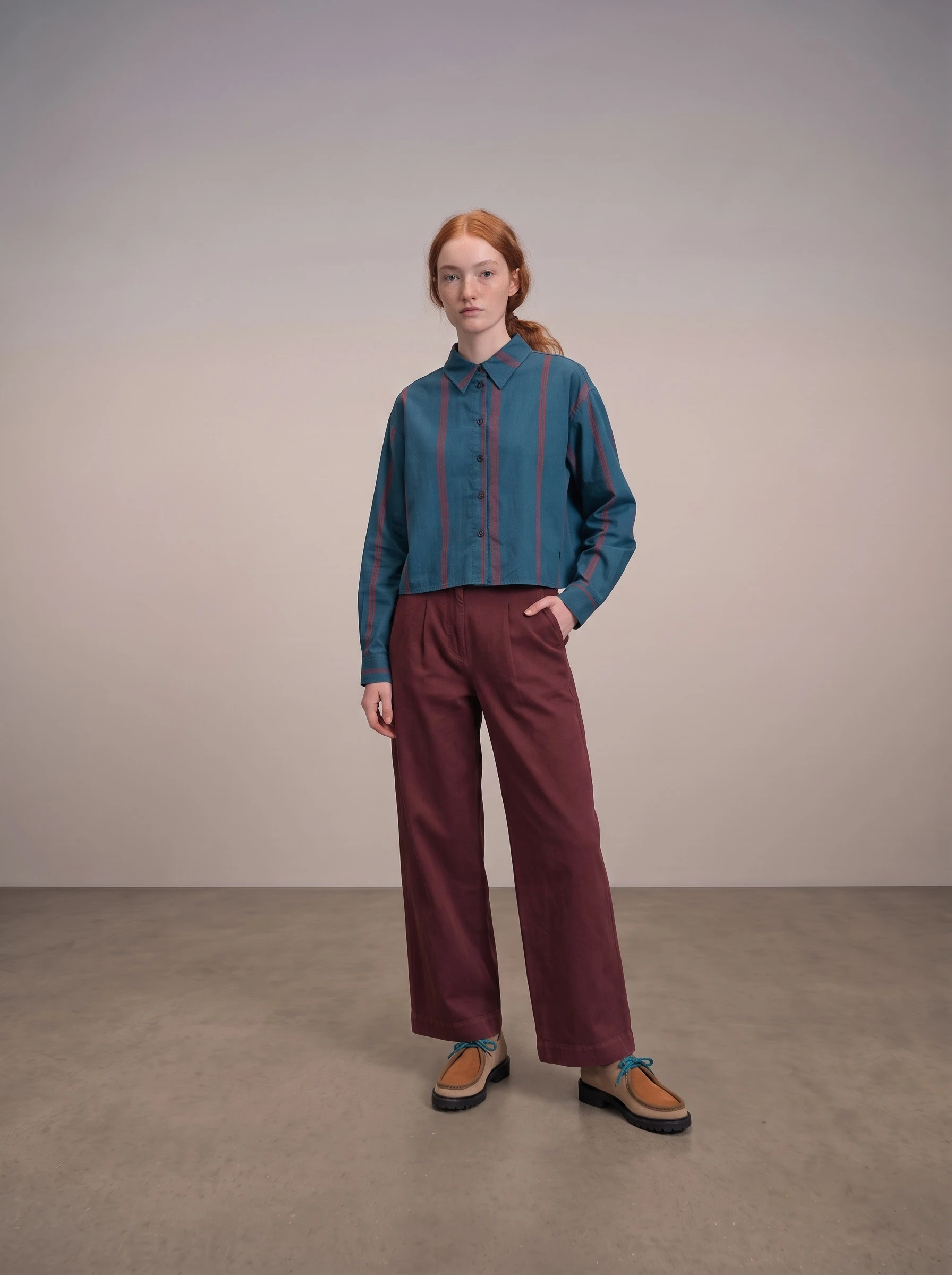 Reference-based result of the blue striped shirt with one hand in a trouser pocket